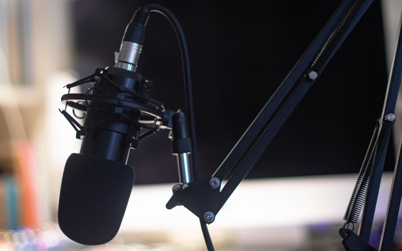 A studio microphone, with audio diarized into speaker segments